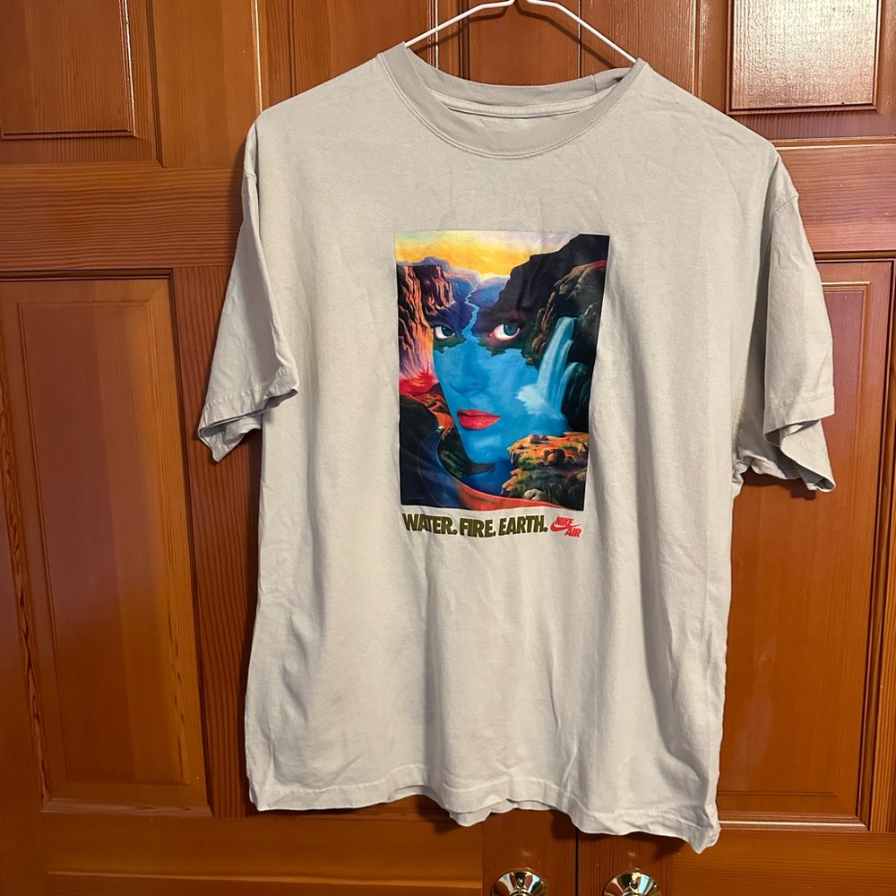 Nike Men’s Graphic Tee, Size XL loose fit. Cream color tee.